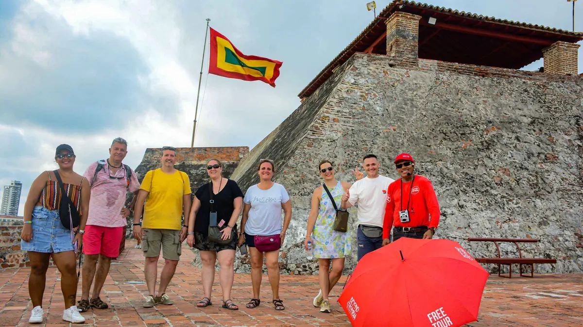 Travelers walking up to the hilltop fortress on a shared tour to Castillo San Felipe de Barajas in Cartagena, Colombia